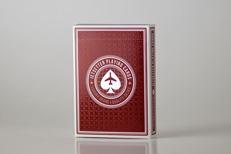 Red Jet colored custom playing cards front posed for photograph