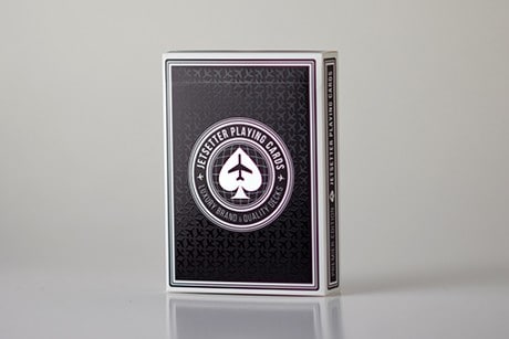 black custom deck of cards with jet posed for photographt